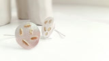 round shaped earrings silver and gold