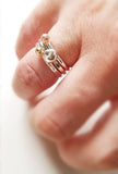 stacking silver rings with gold pebbles